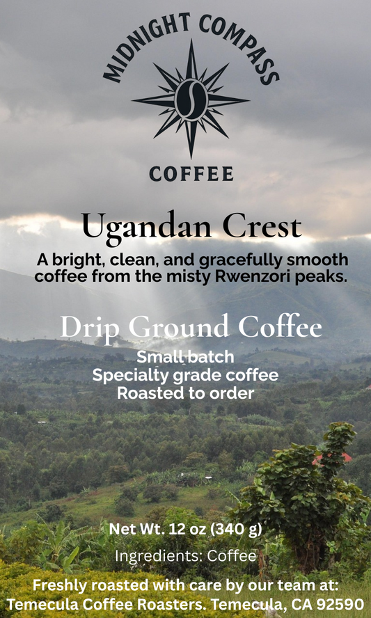 Midnight Compass Coffee: Ugandan Crest - A bright, clean, and gracefully smooth medium roast coffee from the misty Rwenzori peaks.
